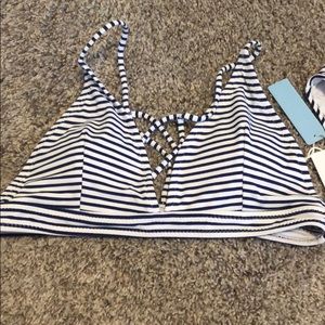 Blue and white striped bathing suit